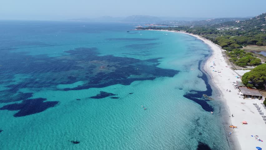 Drone shot over beautiful sea and beach, Plage de Palombaggia, Corsica
