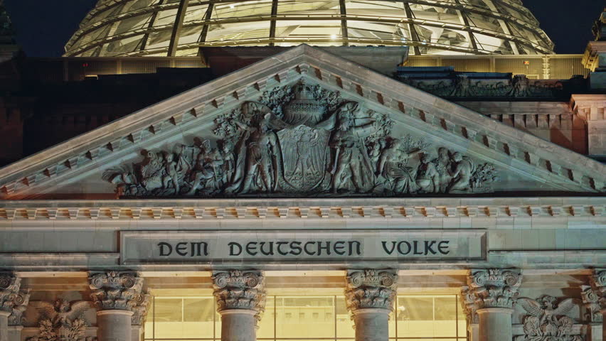  View of the Reichstag, the German parliament at night in Berlin Germany