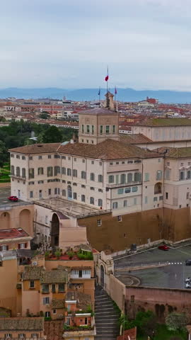  Aerial view rooftops of the city of Rome, Italy. Establishing shot of the capital
