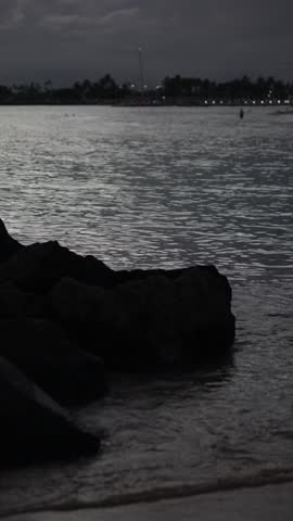 Vertical View of Twilight Above Waikiki Beach After Sunset, Honolulu, Hawaii USA
