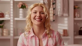 Happy laughing healthy smiling joyful teenager girl woman female in pink candy bathroom indoors looking at camera laugh touching smooth skin self care emotion portrait fun joy soapy bubble blower - Powered by Shutterstock - Get 15% off with code: PIKWIZARD15