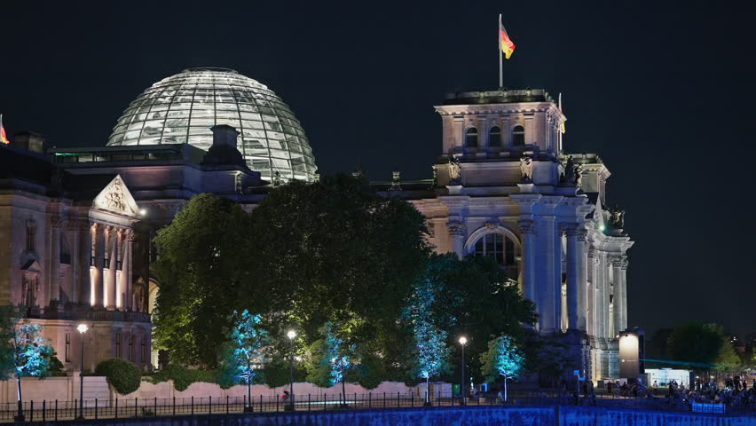 A view from the embankment of Berlin at night, overlooking famous architectural landmarks. Berlin,Germany