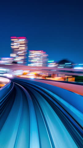 Vertical. Hyperlapse of automatic train moving to tunnel in Tokyo, Japan.