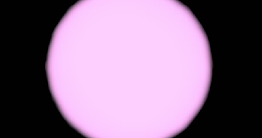 Silhouette of two hands forming a heart shape against a glowing pink circle light background, symbol of love and romance.