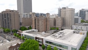 Midtown Atlanta skyline buildings and upscale neighbourhood with tree lines streets, urban green spaces, Georgia, Aerial, Panoramic view - Powered by Shutterstock - Get 15% off with code: PIKWIZARD15
