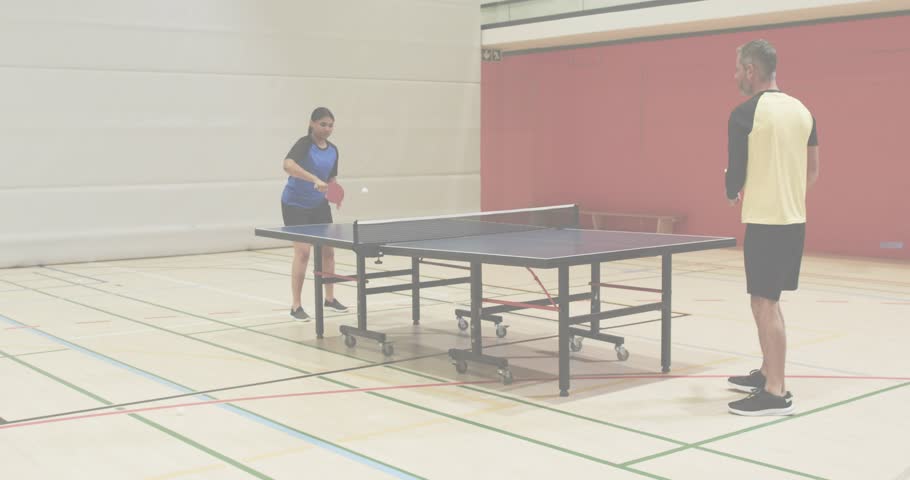 Table tennis partners initiating rally with ball toss and strokes, HUD highlighting ball path. Athletic, competition, sport, confrontation, agility, teamwork, dynamic