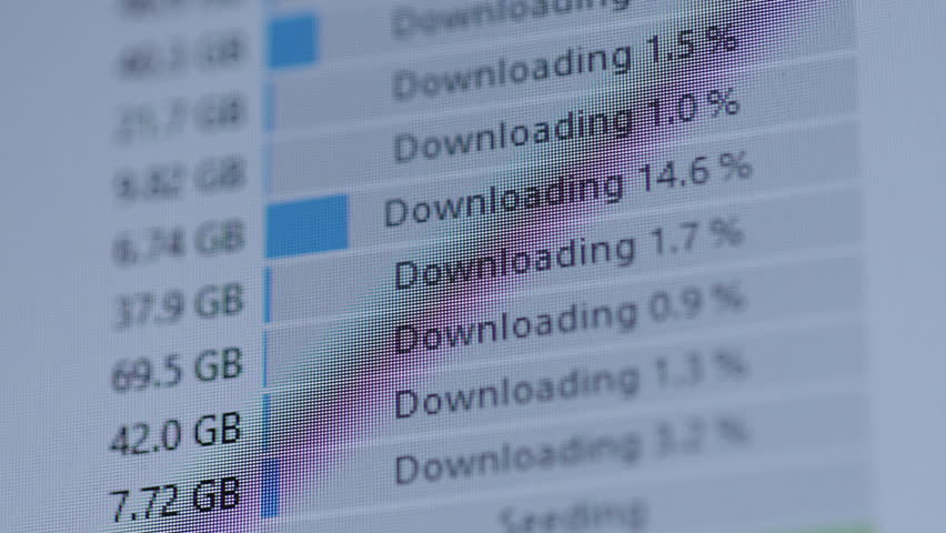 Computer screen displaying multiple files actively downloading, showing progress bars and percentage completion for each data transfer, representing network communication concept close-up, slow motion - Powered by Shutterstock - Get 15% off with code: PIKWIZARD15