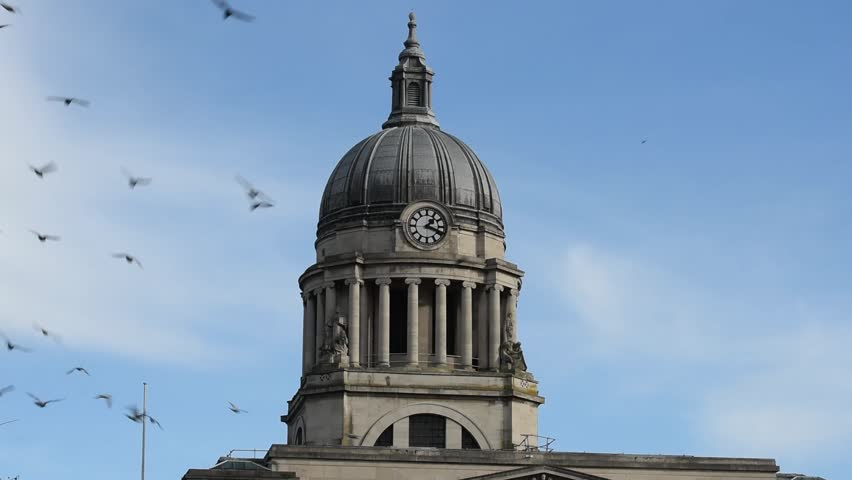 Close-up view of the historic Council House Clock, a landmark in Old Market Square at the heart of Nottingham city centre, England, highlighting its architectural details.