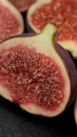 Juicy Sliced figs fruit macro, rotation