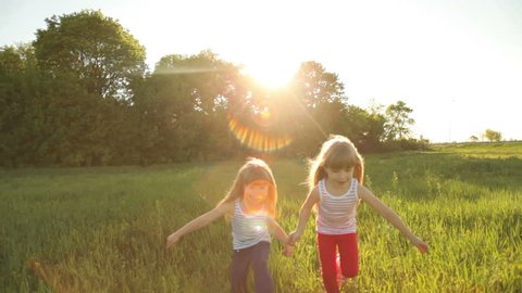 Two girls are playing catch-up with flare 
 Stock Video
