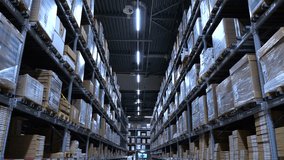 Camera moving through a long, dark corridor of a large storage warehouse filled with cardboard boxes and packages stacked high on metal shelves, showcasing industrial logistics and distribution - Powered by Shutterstock - Get 15% off with code: PIKWIZARD15