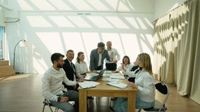 Business team celebrating success giving high fives in office - Powered by Shutterstock - Get 15% off with code: PIKWIZARD15