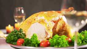 Slow motion carving of roasted turkey breast, slicing juicy meat, symbolizing festive dining, holiday celebration, and traditional family meals. - Powered by Shutterstock - Get 15% off with code: PIKWIZARD15