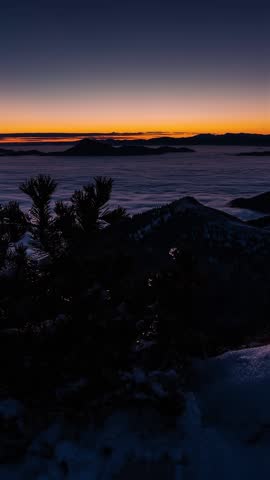 Colorful Winter Sunrise Over Snowy Mountains, Vertical Time lapse