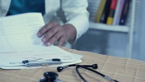 Doctor's hands, documents, and writing in a medical checklist, medical record, or hospital record for patient care or progress. Clinician or surgeon at clipboard, documents, and medical results or rep - Powered by Shutterstock - Get 15% off with code: PIKWIZARD15