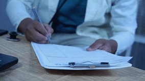 Doctor's hands, documents, and writing in a medical checklist, medical record, or hospital record for patient care or progress. Clinician or surgeon at clipboard, documents, and medical results or rep - Powered by Shutterstock - Get 15% off with code: PIKWIZARD15