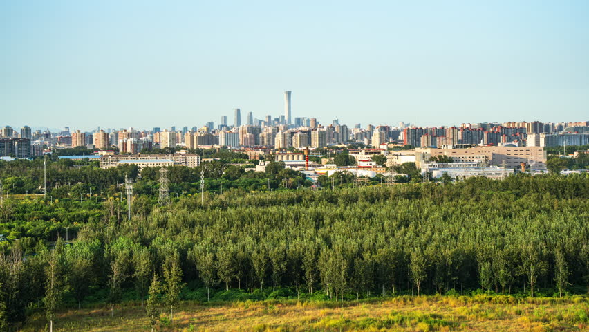 Beijing, China, where forests and bustling building complexes coexist in harmony