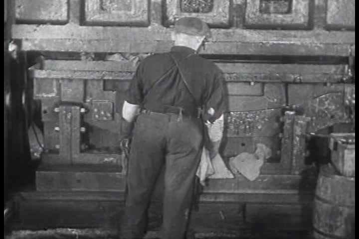 1930s - Workers at the General Motors automobile car factory in Detroit in 1933. Royalty-Free Stock Footage #3910133