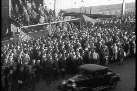 1930s - Workers stream into the General Motors automobile factory in the 1930s as whole towns spring up around the car industry in Michigan.