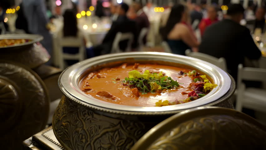 Illustration of Asian cuisine, catering services, buffets, cultural celebration feasts. Fancy pots with creamy curry sauce and butter chicken garnished with fresh herbs