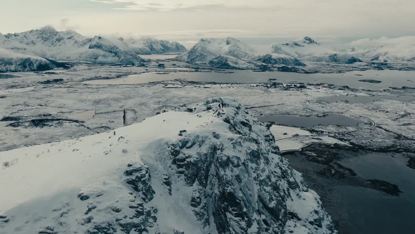 Hikers On Mountain Peak In Norway - Aerial Drone Shot