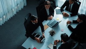 Top view of manager working on laptop and sending data analysis to business people by using VR glass headset while diverse team moving gesture while working together to planning idea. Directorate. - Powered by Shutterstock - Get 15% off with code: PIKWIZARD15