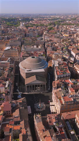 Stunning aerial views beautifully showcasing the magnificent architectural beauty of the Pantheon in Rome, artfully surrounded by the vibrant and lively city life. Italy