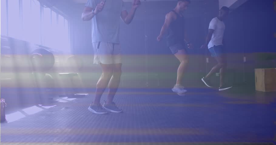 Three partners starting rope swings in gym, synchronizing skipping with glitch for fitness. Fitness, teamwork, athleticism, cardio, modern, dynamic, motion