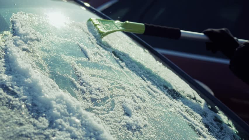 Scraping Thick Frost Off Car Windshield. Ice Scraper Tool, Winter Weather Commute Challenge. Cold Morning Routine, Frozen Car Preparation, Removing Snow And Ice. Winter Season Driving Icy Windscreen