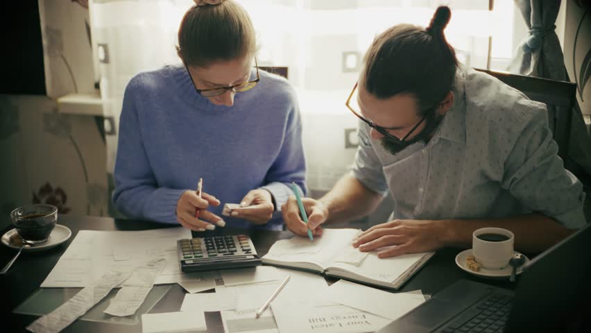 Household Accounting And Business Administration, Serious Financial Decision Making Careful Expense Analysis. Tax Documents And Utility Bills, Overwhelmed By Paperwork And Bills. Personal Finances