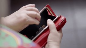 Hand Opening Wallet To Find Only Few Coins. Financial Crisis And Economic Hardship, Budgeting Stress And Saving Money, Poverty And Low Income, Running Out Of Cash For Purchases. Tight Budgeting - Powered by Shutterstock - Get 15% off with code: PIKWIZARD15