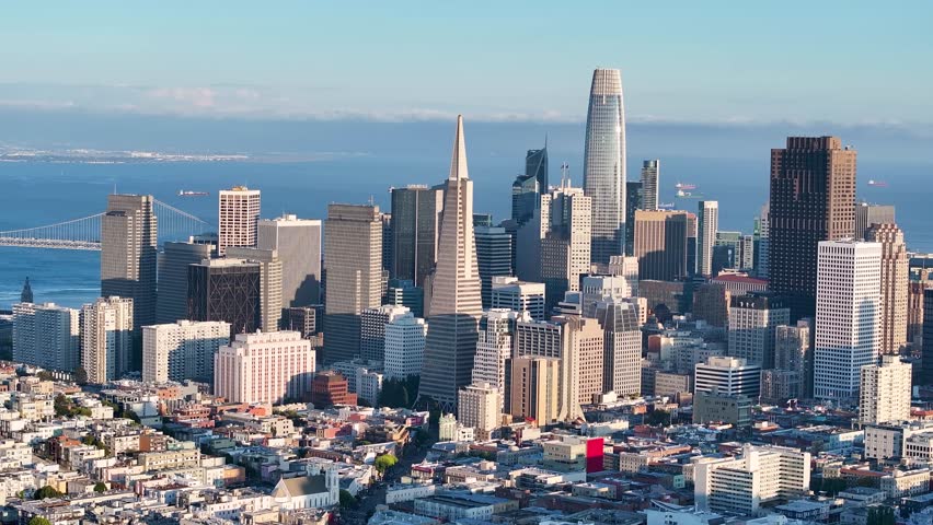 Aerial view of the vibrant San Francisco skyline with its towering skyscrapers and iconic landmarks against the backdrop of the bay, San Francisco, California, United States.