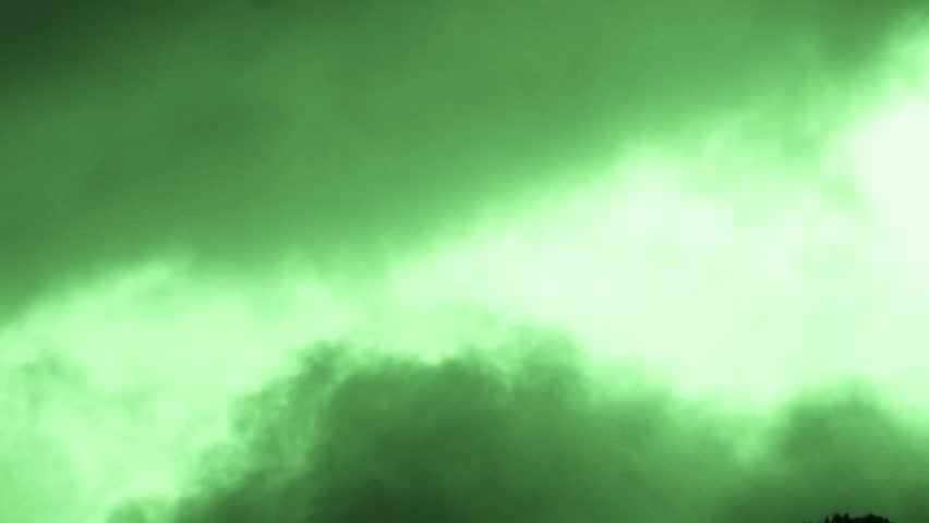 Layers of Abstract Stylised Green Clouds Passing Slowly.