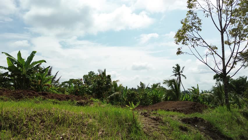 An aerial view of enduro motocross. Riders compete on the trail in the off-road category. Riders train on motorcycles, jumping up and down hills at high speed and performing tricks.