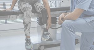 Clinician connecting hose activating map overlay as patient flexing prosthesis assessing health. Rehabilitation, prosthesis, diagnostics, analysis, healthcare, assistive, medical - Powered by Shutterstock - Get 15% off with code: PIKWIZARD15