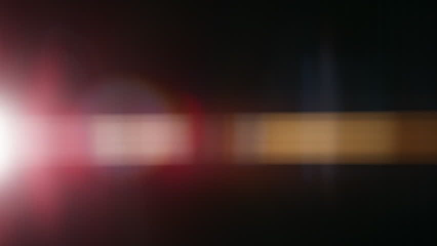 Real Shooted Anamorphic Lens Flare Transition on Black Background in Super Slow Motion.