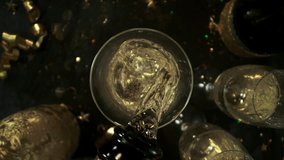 Super Slow Motion Shot of Pouring Champagne with Camera Motion Into Liquid at 1000fps. - Powered by Shutterstock - Get 15% off with code: PIKWIZARD15