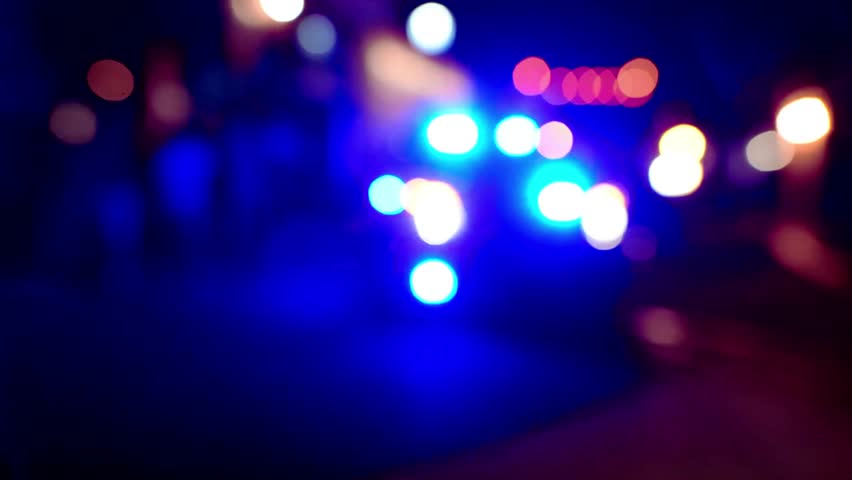 Emergency lights flash with urgent intensity, ideal for news, crime, or action sequences. Capture the dynamic energy and motion of first responders in the night.