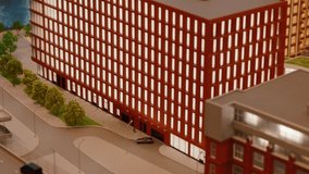 Model of modern residential building with red facade - Powered by Shutterstock - Get 15% off with code: PIKWIZARD15