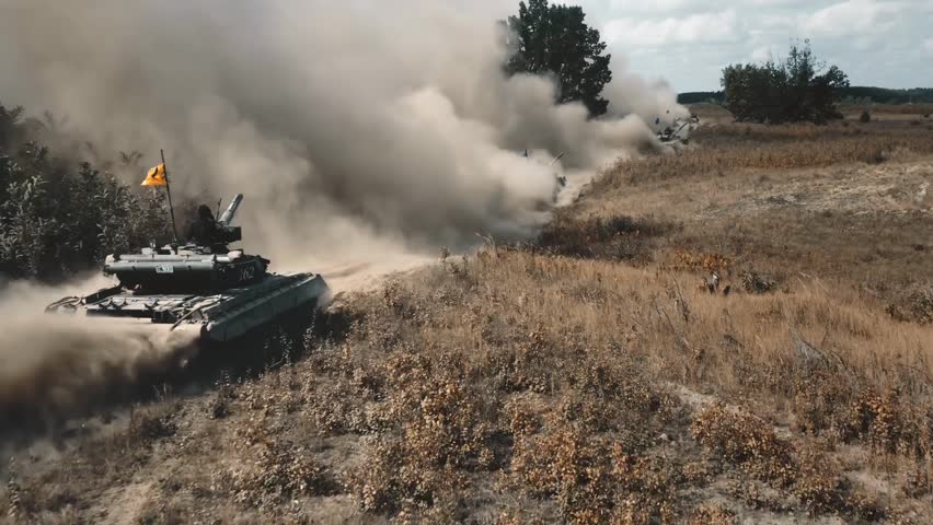 Armored military vehicles and gunners on a battlefield, showcasing tanks, machinery, defense operations, and military maneuvers.