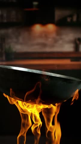 Super Slow Motion of Flying Asian Wok Ingredients . Filmed on High Speed Cinema Camera