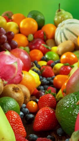 Various Kind of Fresh Fruits and Vegetable . Camera Placed on Motion Control System . Filmed on High Speed Cinema Camera . Camera in Motion. Vertical Aspect Ratio