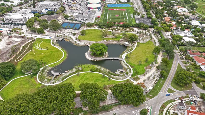 Aerial View of Bayshore Park in Miami Beach, Florida USA, Lake and Senior High School Buildings and Sports Fields
