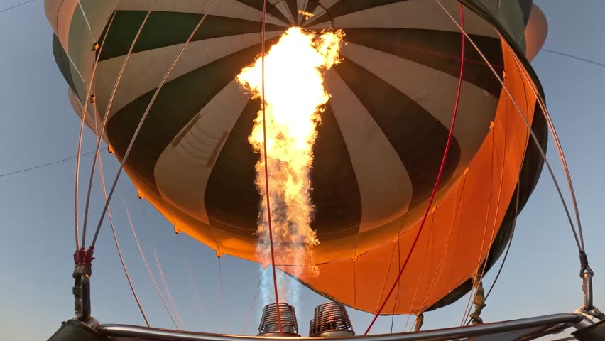 Flames Ignite Colorful Hot Air Balloon
