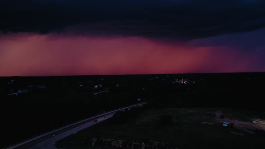 Wisconsin massive lightning storm rolling over the horizon in rural Wisconsin.