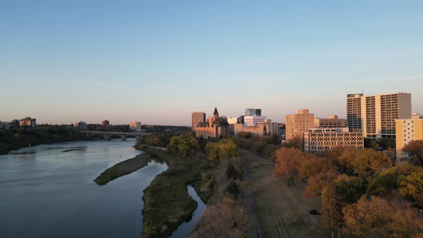 Downtown Saskatoon skyline and Bessborough Hotel at sunrise drone aerial in fall