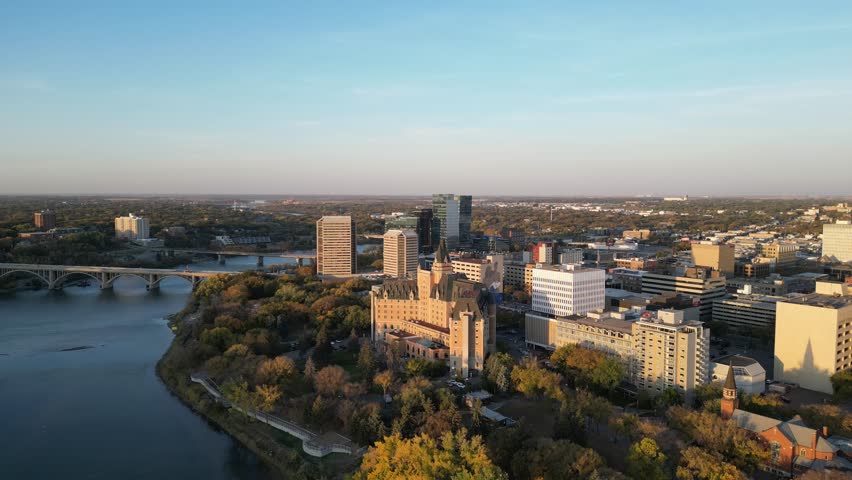 Downtown Saskatoon skyline and Bessborough Hotel at sunrise drone aerial in fall