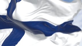 Close-up of the national flag of Finland, featuring a blue Nordic cross on a white background, Seamless 3d render animation. Slow motion loop. Selective focus - Powered by Shutterstock - Get 15% off with code: PIKWIZARD15