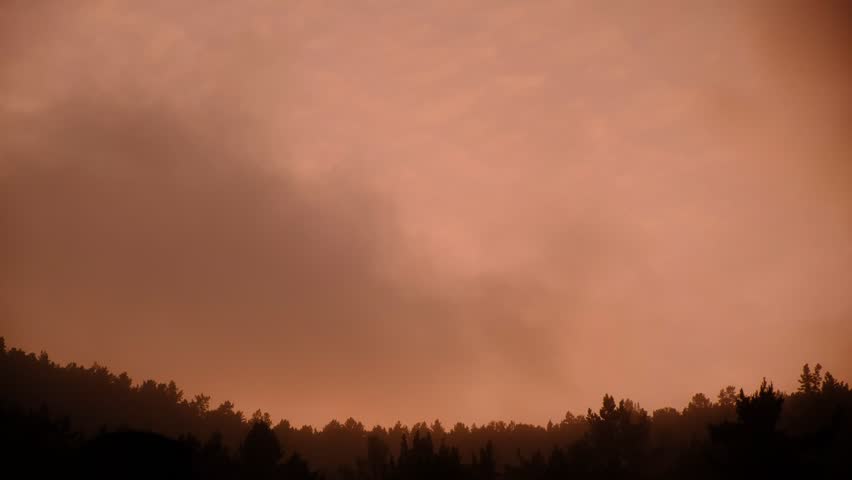 Misty landscape with fir forest. Cottage roof, bungalow. Surreal atmospheric mood. Dark Spruce Wood silhouette surrounded by Fog. Panoramic foothills, mountains. Surreal journey, spirituality