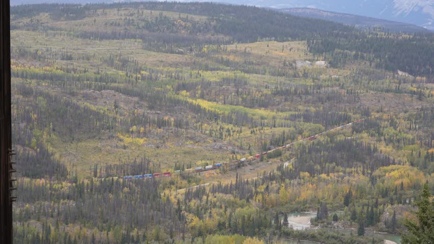 Town of Jasper in Canadian Rockies from Skytram. Pyramid Mountain, Pyramid Lake, Mount Robson, Miette Mountain Ranges, Jasper Park Lodge and VIA Rail Jasper train